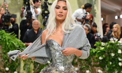 styleFashion Kim Kardashian reveals why she wore grey cardigan to Met Gala after accessory confused fans