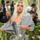 styleFashion Kim Kardashian reveals why she wore grey cardigan to Met Gala after accessory confused fans