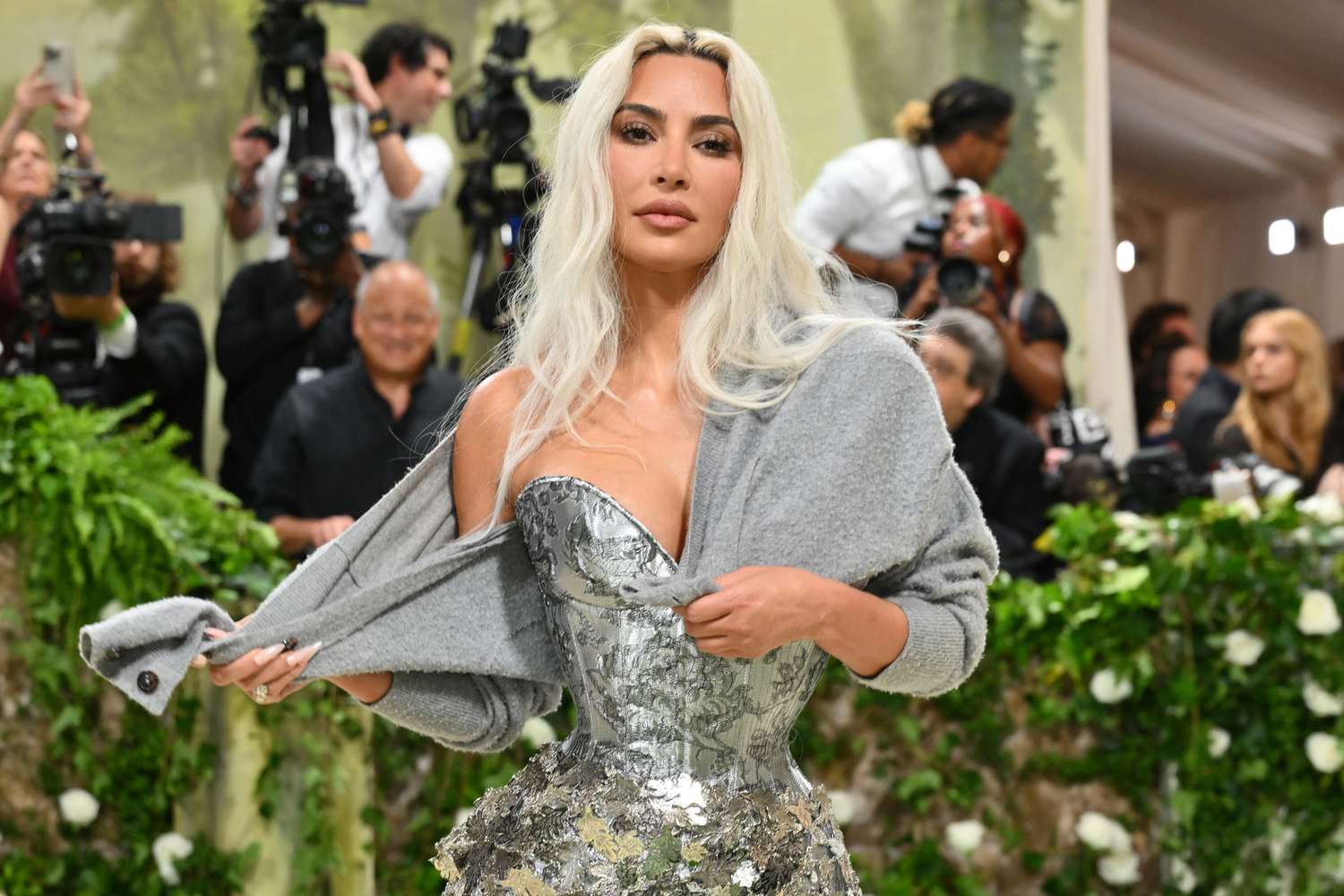 styleFashion Kim Kardashian reveals why she wore grey cardigan to Met Gala after accessory confused fans