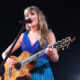 Watch Video of Taylor Swift commanding attention in a sparkly red ensemble as she took to the stage in Paris for night four of the French stint of her Eras tour on Sunday.